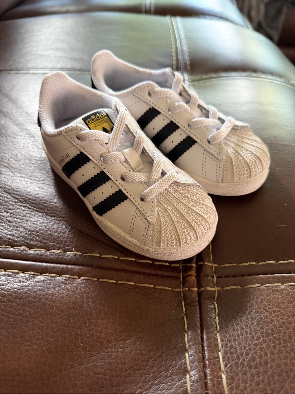 Adidas superstar toddler size 7 white and black, slip on shoe